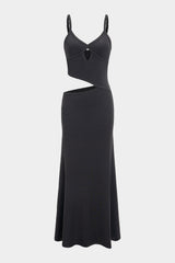A black maxi dress with cut-out details is displayed flat against a white background.