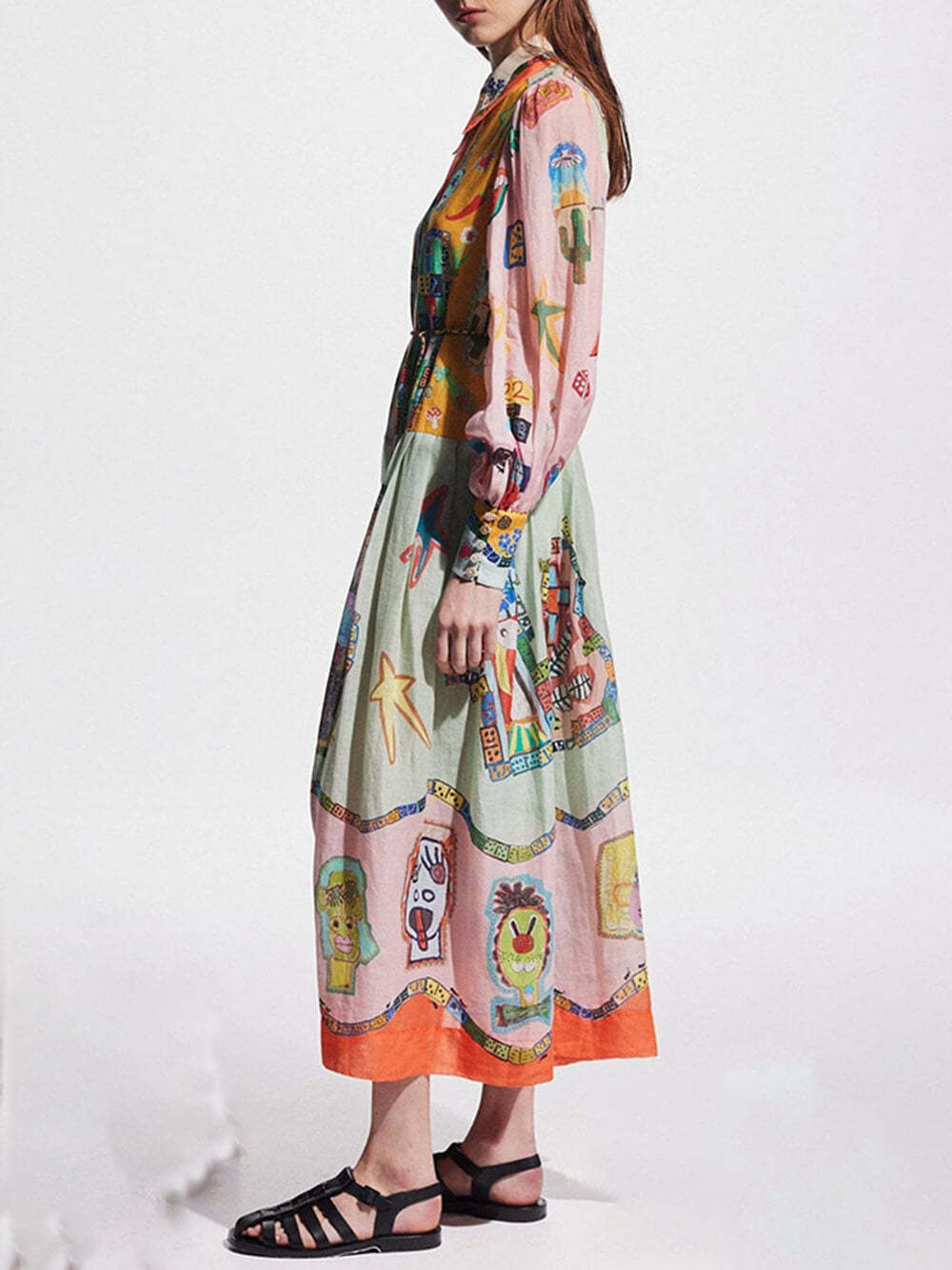 side view of a woman in a multi-colored abstract print dress