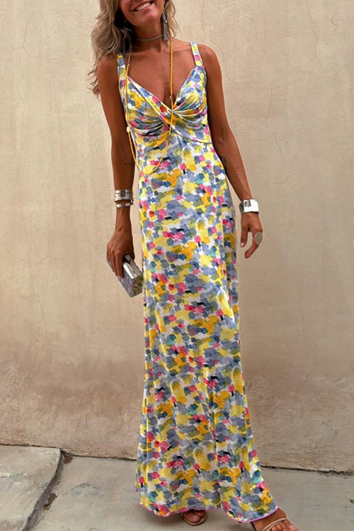 Woman wearing a colorful abstract print maxi dress