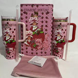 Stanley 40oz Sweet Berry Daydream Tumbler with pink Strawberry Shortcake artwork and ergonomic handle - View 5 | Clistos