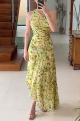 woman in yellow and green floral print one-shoulder pleated dress with cut-out detail