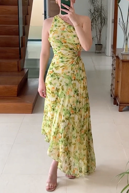woman in yellow and green floral print one-shoulder pleated dress with cut-out detail