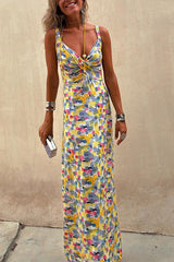 Close-up of a woman in a patterned maxi dress