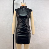 Black leather bodycon dress with ruched detailing and attached gloves displayed on a mannequin.
