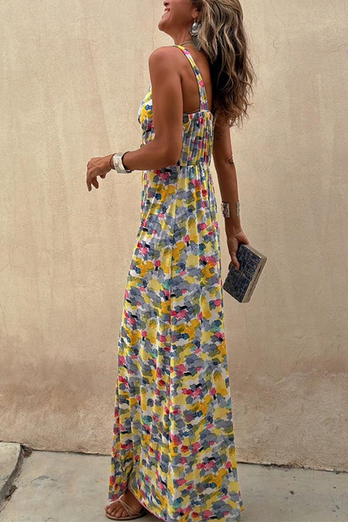 Side view of a woman in a flowing maxi dress