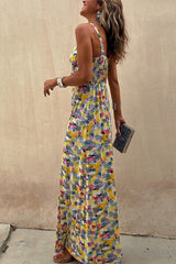 Side view of a woman in a flowing maxi dress