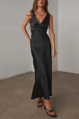 woman in black satin v-neck maxi dress