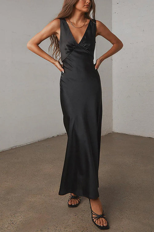 woman in black satin maxi dress