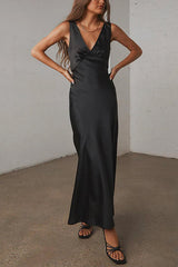 woman in black satin maxi dress