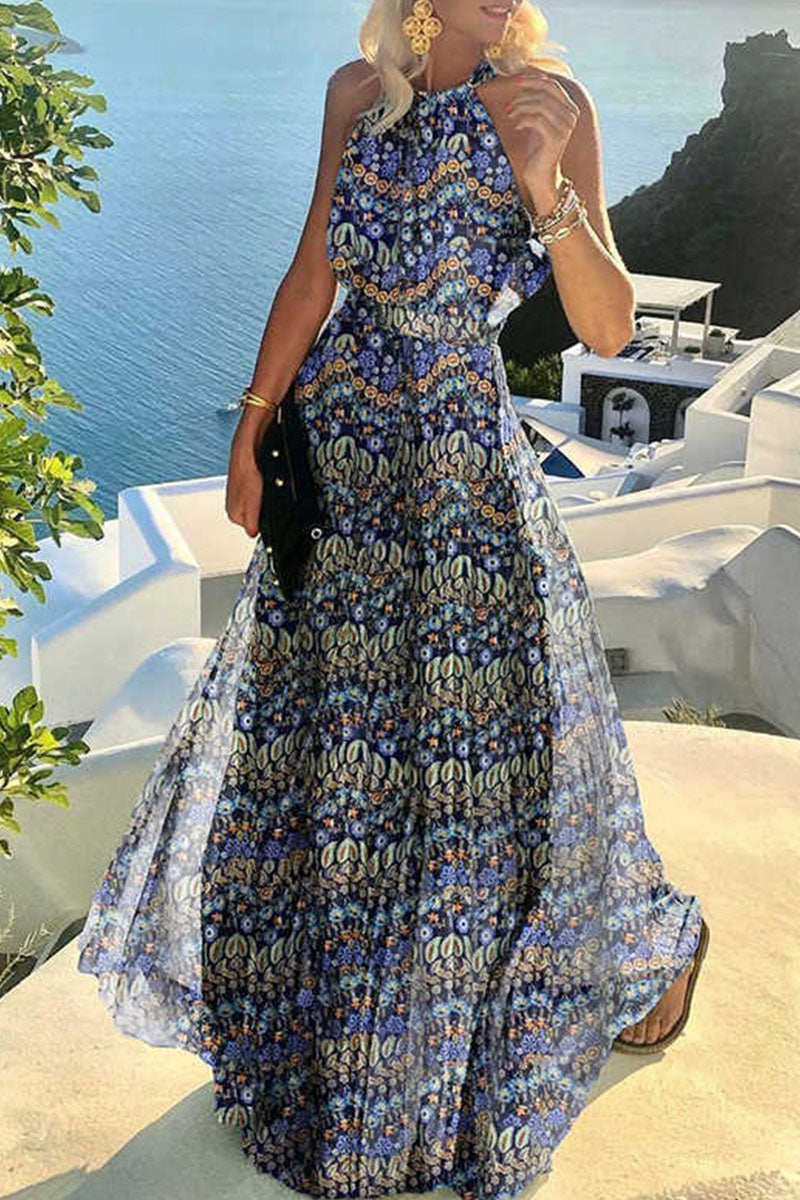 woman in a blue floral maxi dress