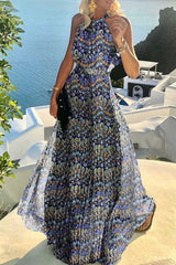 woman in a blue floral maxi dress