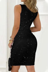 Back view of a woman in a black sparkly ruched v-neck sleeveless dress
