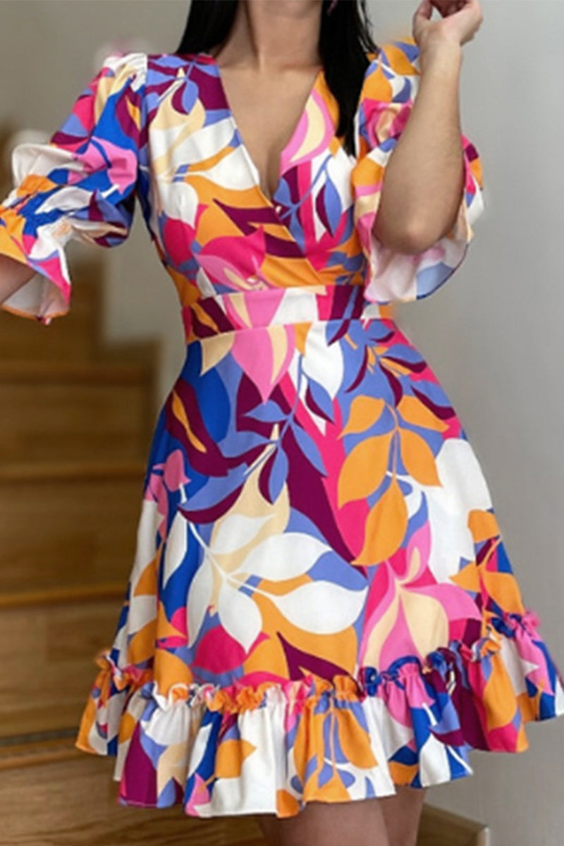 woman wearing a colorful floral print dress