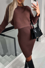 Woman in a brown ribbed knit sweater dress and black boots