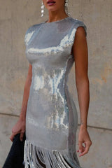 Detail of the silver sequined dress with fringe hem.