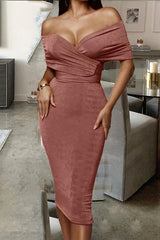 woman wearing a dusty rose off-the-shoulder midi dress with a belted waist