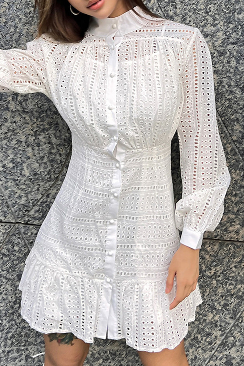 woman wearing a white eyelet dress