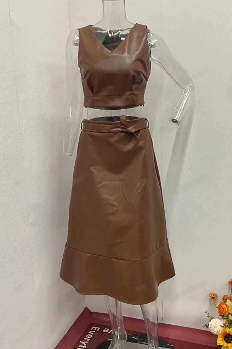 brown leather two-piece set displayed on mannequins