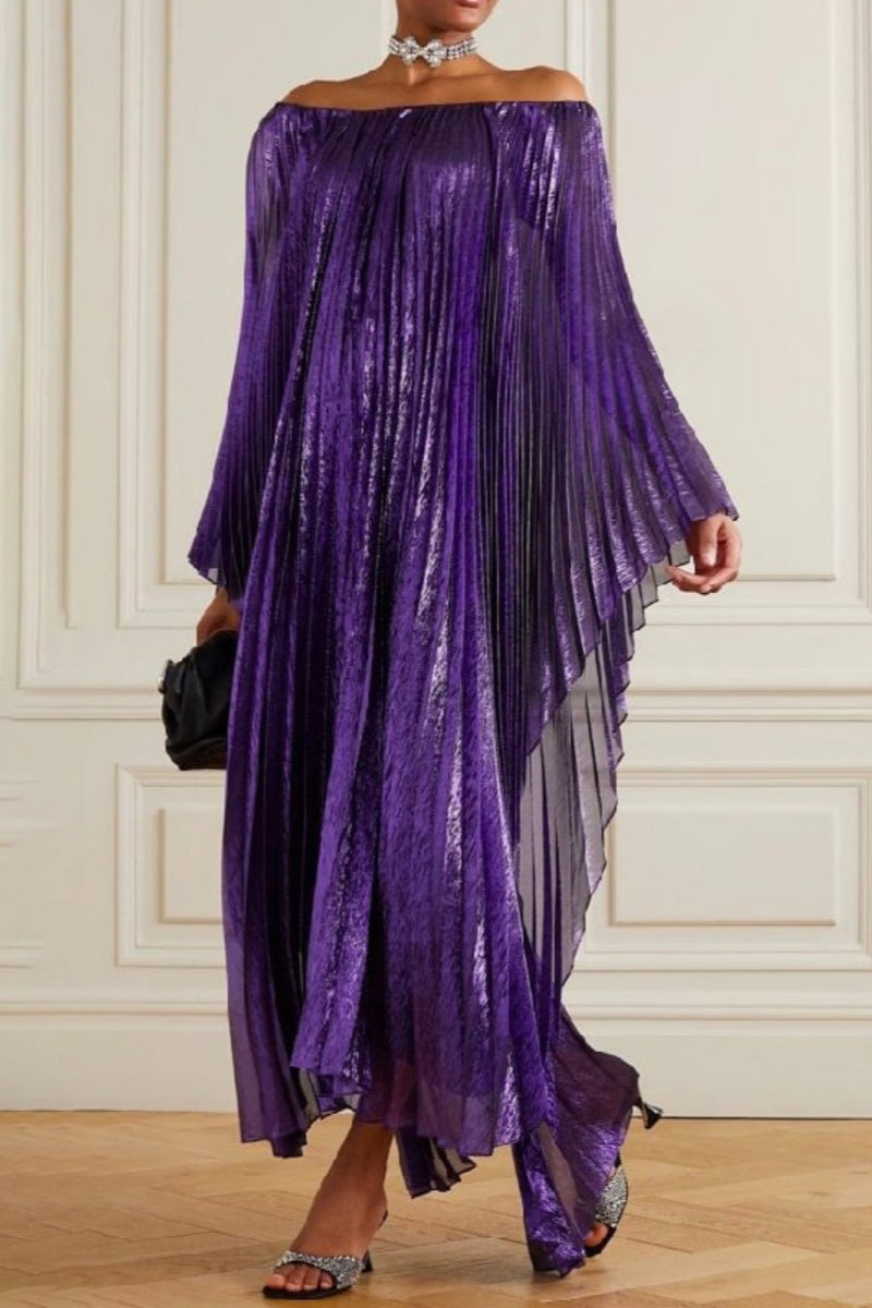 Woman wearing a long, flowing, off-the-shoulder purple metallic pleated dress with cape-like sleeves.