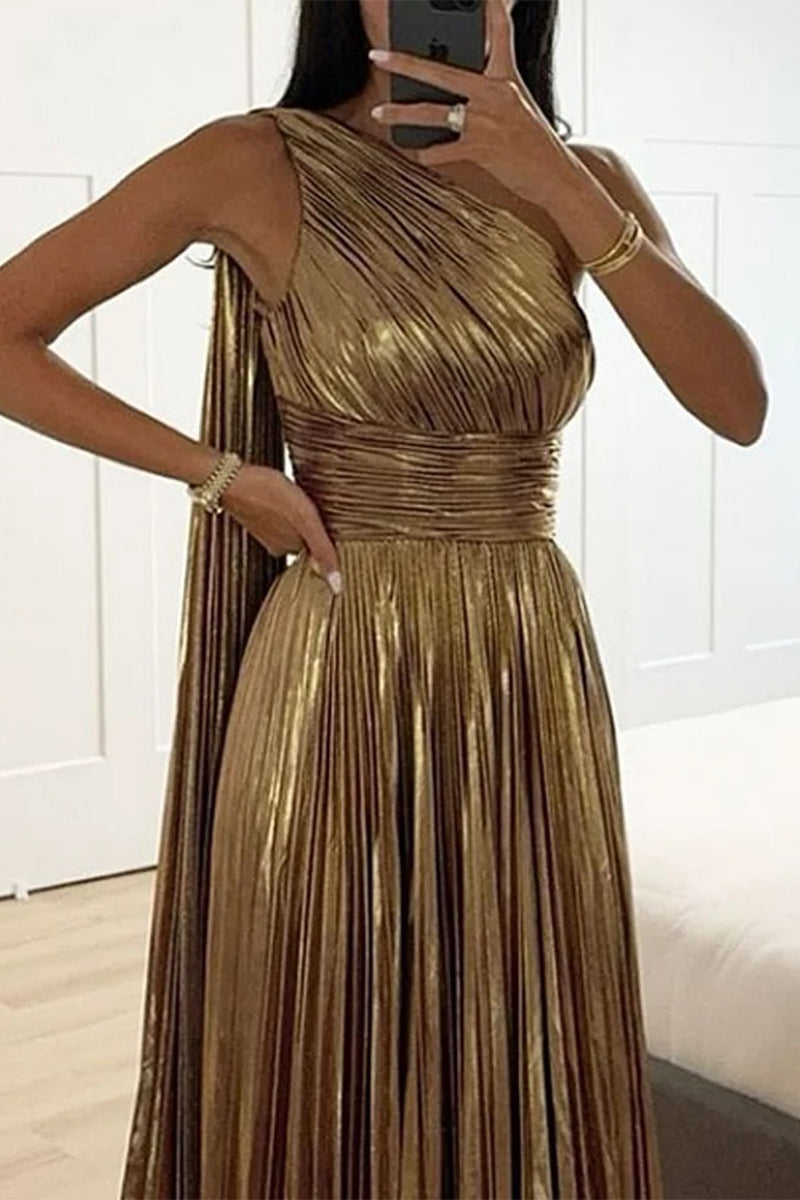 Close-up of the pleated bodice and empire waist of a gold formal gown.