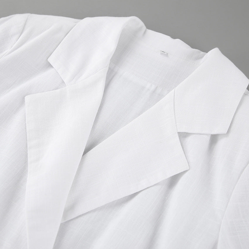 White ruched v-neck bodycon mini dress with blazer collar and ruffle hem - View 17 | Clistos
