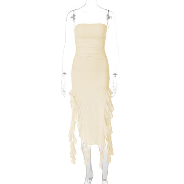 Cream strapless ruched midi dress with ruffled asymmetrical hemline and high slit on a mannequin.