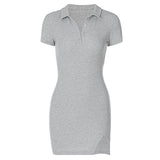 A grey ribbed knit polo dress with short sleeves and a side slit.