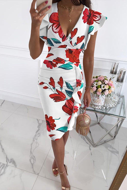woman in white floral print dress