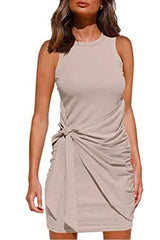 woman wearing a beige ruched twist knot sleeveless mini dress