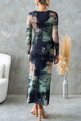 Back view of a woman wearing a long-sleeved, abstract print midi dress.
