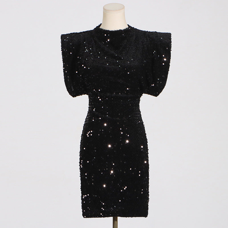 black sequined dress on a mannequin, front view