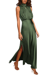 Woman wearing an olive green satin maxi dress with a high neckline, sleeveless design, and a high slit on the leg.
