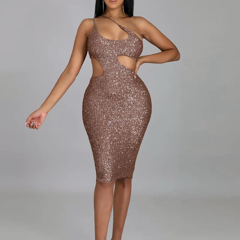 Woman in a bronze sequined one-shoulder dress with cut-outs, shown from the front