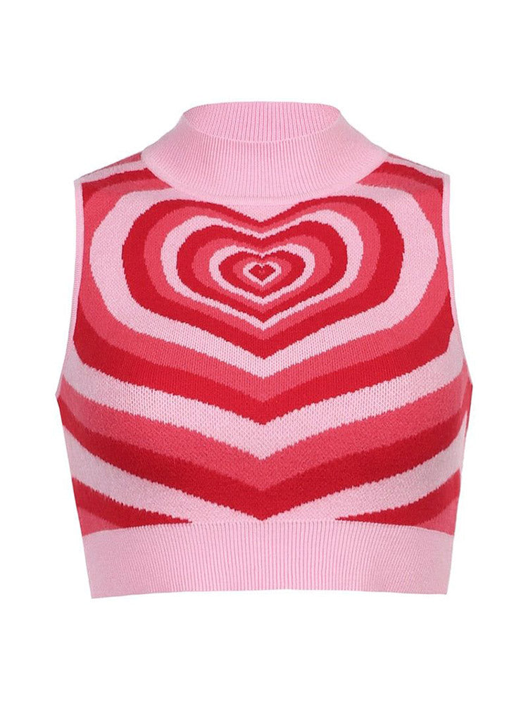A pink and red striped heart pattern cropped knit top with a mock neck, shown flat.