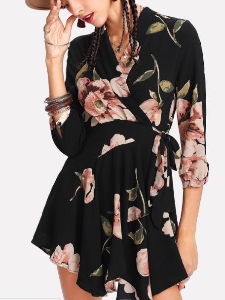 woman wearing a black floral wrap dress