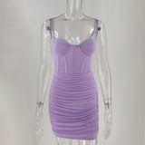 Front view of a lavender ruched mini dress with a corset bodice on a mannequin