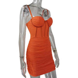 side view of an orange ruched mini dress with a corset bodice on a mannequin