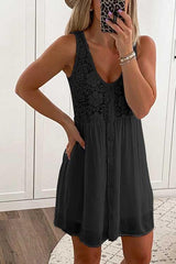 woman wearing a black sleeveless v-neck lace-trim button-down a-line dress