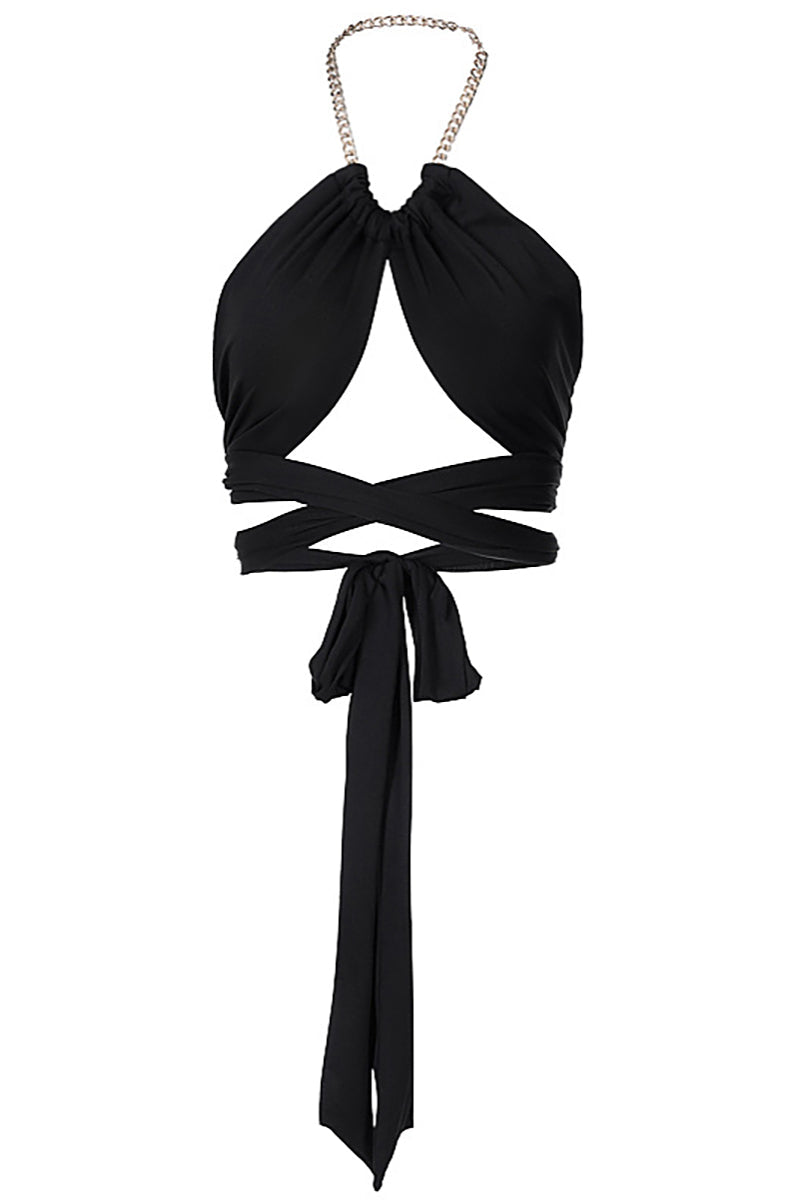 Black halter crop top with a cut-out front and gold chain detail, laid flat.