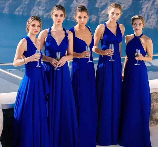 five women in royal blue convertible strap maxi dresses