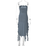 Mannequin displaying the back of a slate gray strapless ruched dress with ruffled fringe detailing.
