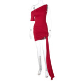 A red one-shoulder mini dress with ruching and a high slit is displayed on a mannequin.