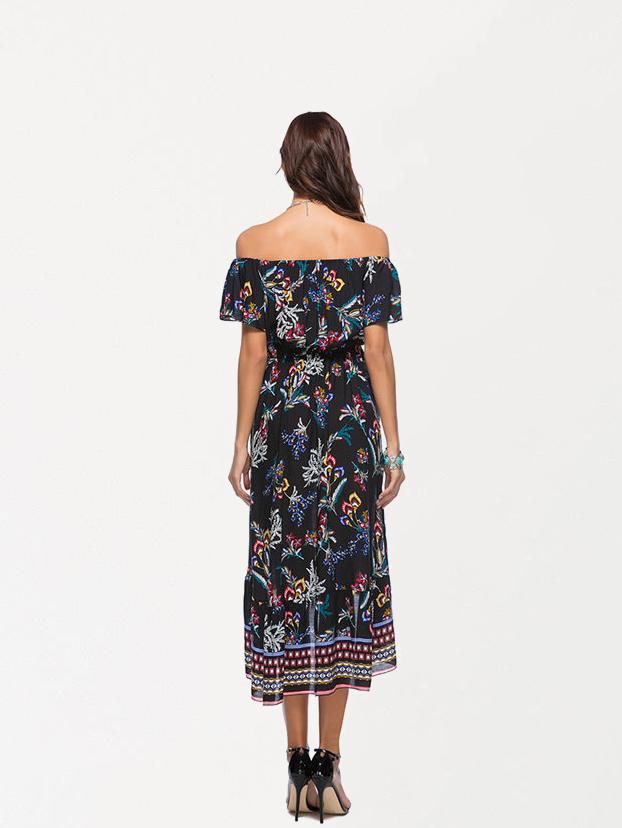 The back of a woman wearing a black off-the-shoulder dress with a floral print.