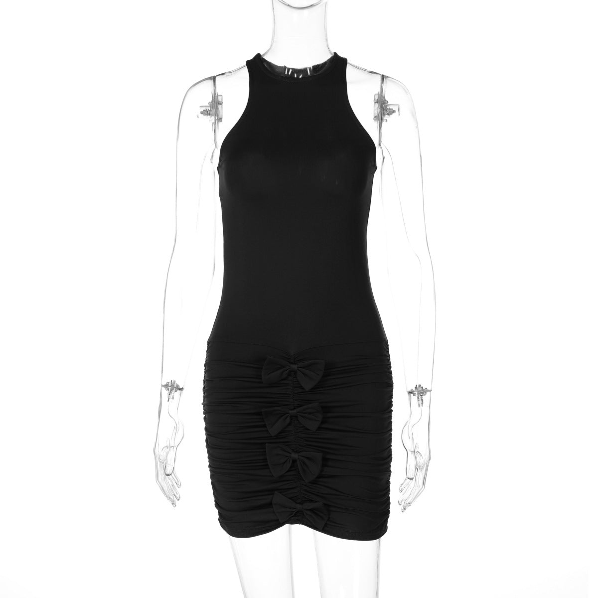 Black sleeveless mini dress with ruching and bow details on a mannequin.