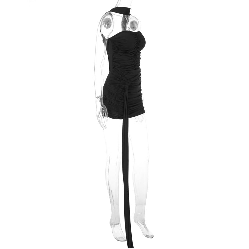 Mannequin displaying a black strapless ruched mini dress with a draped sash and choker detail.