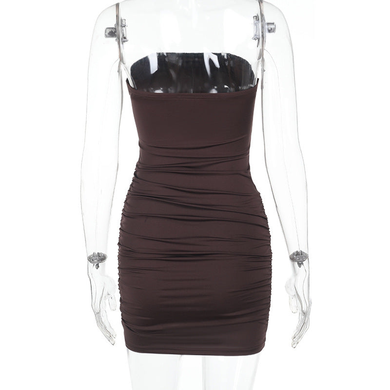 A brown strapless ruched dress on a mannequin, back view
