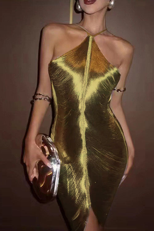 A woman in a shimmering gold halter dress with a ruched bodice and a thigh-high slit, holding a metallic clutch.