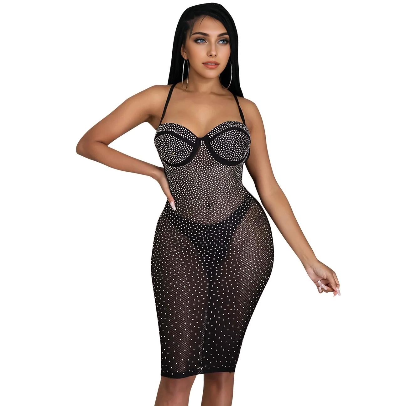 A woman in a black rhinestone-embellished sheer dress with a sweetheart neckline and halter straps, shown from the front.