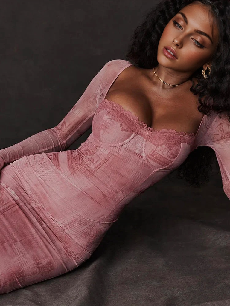 Close-up of a woman in a pink mesh dress, highlighting the lace trim and the patterned fabric.