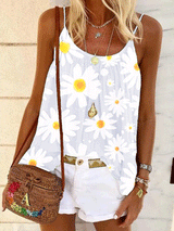 Woman wearing a light blue tank top with a white daisy print, white shorts, and a woven crossbody bag.